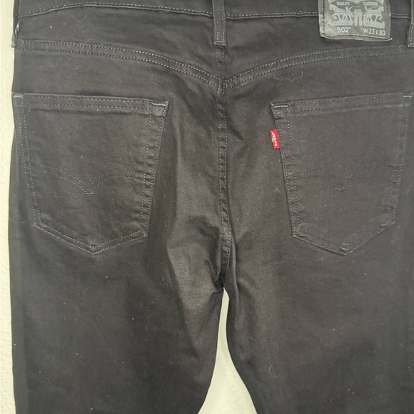 502™ TAPER FIT MEN'S JEANS Size 33x30 Black Color. - Picture 3 of 8